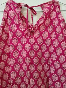 Pink Printed Tie-Up Neck Sleeveless Short Kurti
