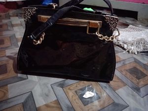 Chic Black Patent Handbag with Gold Chain
