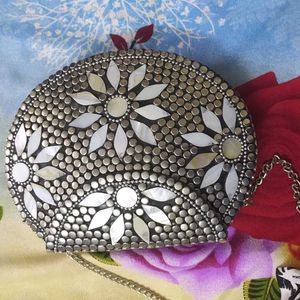 Anekaant Embellished Half Moon Clutch with Chain