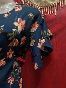 It Is Jean Top With Blue Floral Design.
