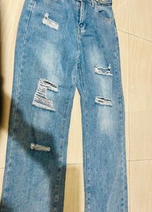 Distressed Blue Denim Jeans