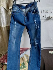 Distressed Blue Denim Jeans