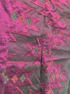 Elegant Purple Saree with Intricate Patterns