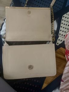 Elegant Beige Quilted Sling Bag