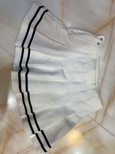White Pleated Mini Skirt with Black Stripes