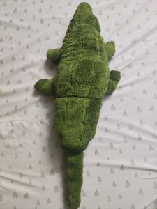 cozy alligator plushie