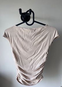 Beige gathered cap-sleeved top