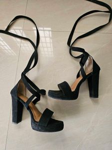 Black Platform Lace-Up Heels.
