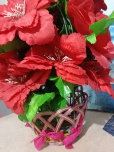 An Artificial Flower Basket For Room Decor