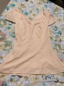 pale cream peplum top