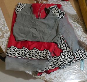 Vibrant Red Saree with Elegant Border