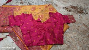 Vibrant Yellow Saree with Pink Blouse