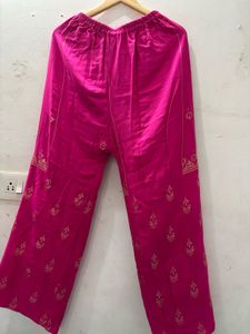 Vibrant Pink Saree with Gold Print