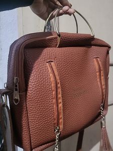 Sling Bag In Dark Brown Color Not Used New Item Very Spacious Have Multiple Sections