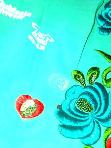 Elegant Turquoise Floral Saree