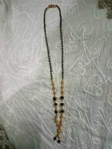 Elegant golden colour Mangalsutra with Black Beads