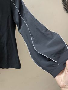 Black statement shirt with white detailing