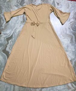 Elegant Beige Gown with Pearl Design
