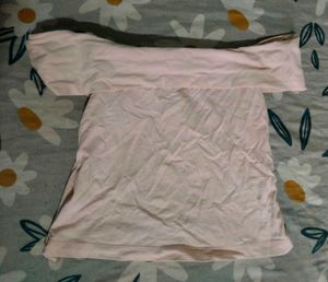 Chic Pink Off-Shoulder Top with Flower Accent