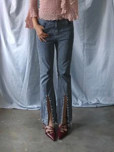 Flared Jeans with Studded Slits