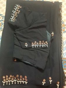 Elegant Black Embroidered georgette Saree attached