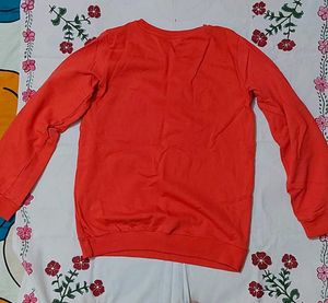 red Crew Neck Sweatshirt with Embossed Symbols