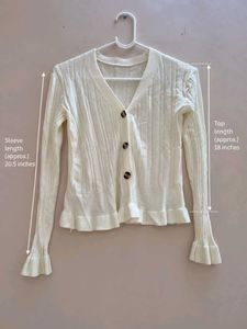 Cream Ribbed Cardigan with Ruffle Hem
