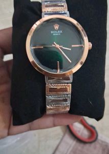 Elegant Green Dial Rolex Watch