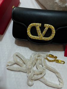 Valentino Black Handbag with Crystal Logo