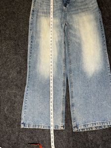 lite used blue baggy jeans