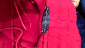 M&amp;S Loose - Fit Highrise Pleated Trousers