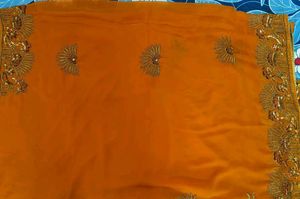 Elegant rust brownish touch saree