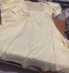 Elegant Light Yellow Kurta Set with Embellishments