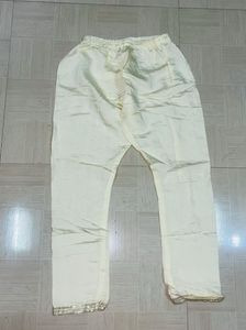 Embroidered Cream Silk Straight Kurta Pant Set.