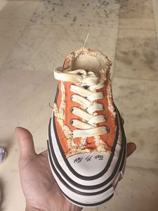 Distressed Orange Sneakers