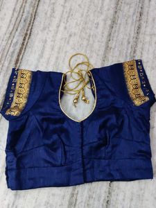 Orange Embroidered Saree with Blue Blouse