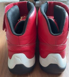 Red Puma High-Top Sneakers