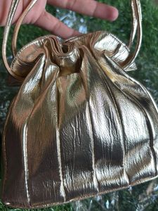 Estee Lauder Glamorous Gold Potli  Bag