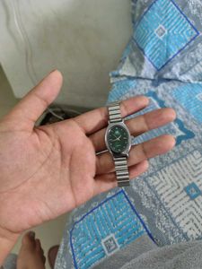 Elegant Oval Green Dial Watch
