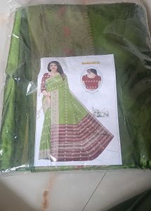 Elegant Green Saree with Maroon Border