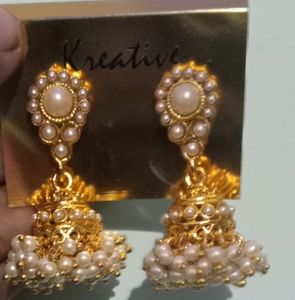 Gold Plated Stylish White Pearl Jhumka Earrings