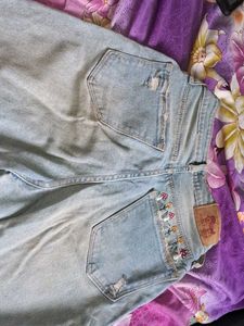 Light Wash Ripped Wide Leg Jeans