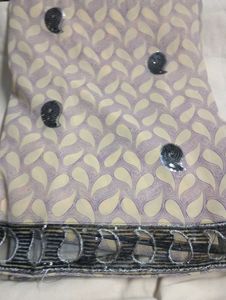 used Elegant net Sequined Saree.without blouse