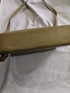 Stylish Beige Shoulder Bag with Chain Detail