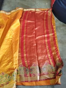 Elegant Orange Silk Saree with Floral Border