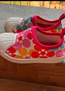 Three pair of kids footwear