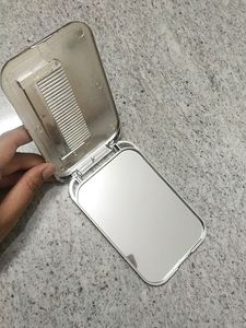 Doll Face Mirror Flip With Comb.