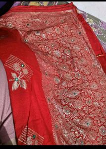 Red chiffon zari saree with stitched blouse