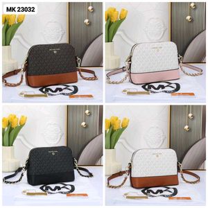 MICHAEL KORS* *MEDIUM LOGO DOME CROSSBODY SLING BA