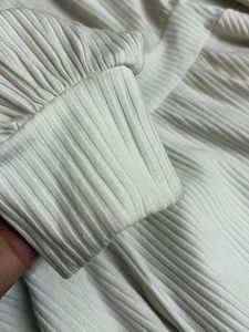 Cream Textured Peplum Top
